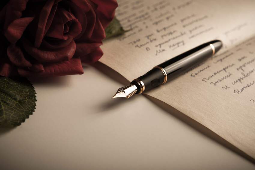 fountain-pen-on-text-sheet-paper-with-rose-iStock_000035296006_Small