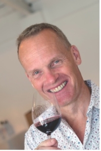 tim atkin with a glass of red wine