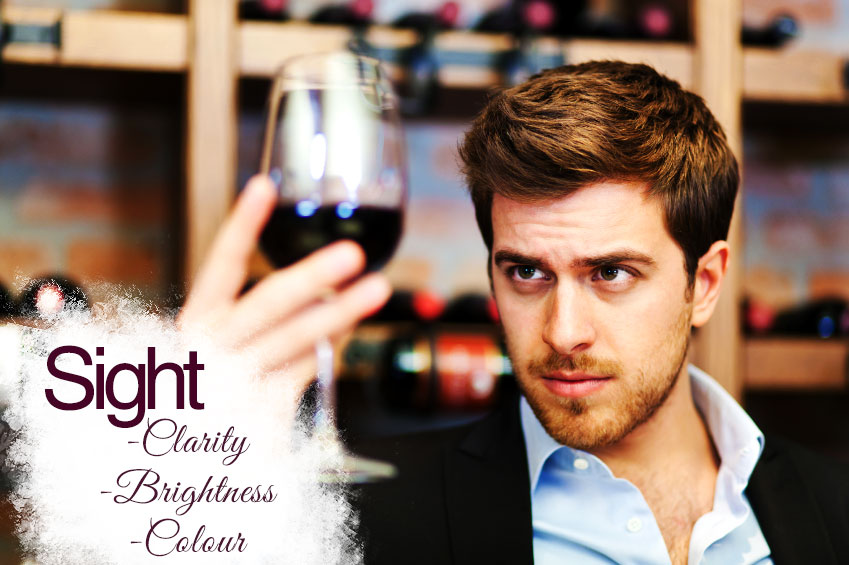 Sommelier-looking-at-wine-iStock_000024194185_Small
