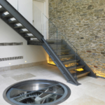 Retractable round glass trap door - hallway